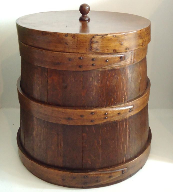 FANTASTIC & UNUSUAL OVERSIZE FIRKIN-BUCKET WITH THE ORIGINAL LID IN PINE & HICKORY WOODS.THIS EARLY LARGE BUCKET IS CONSTRUCTED OF THREE ORIGINAL BAND WRAPS WITH THE ORIGINAL EARLY NAILS AND LID.GREAT STORAGE BUCKET FOR MANY DIFFERENT USES.THIS IS