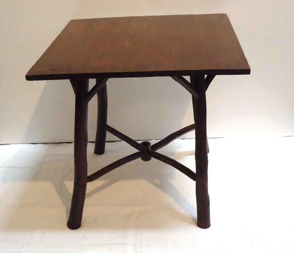 EARLY 20THC OLD HICKORY TABLE IN ORIGINAL OLD STAIN SURFACE.THE SHAPE IS MOST UNUSUAL AND CONDITION IS VERY GOOD.