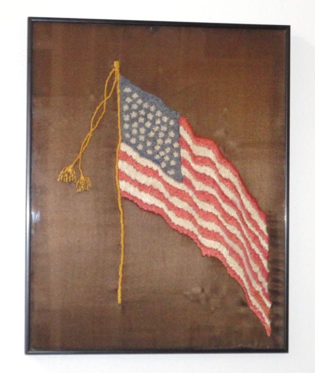 FANTASTIC FRAMED 45 STAR SILK HAND EMBRODERED AMERICAN FLAG ON A BLACK SILK GROUND.GREAT CONDITION AND SIMPLE FORM YET WONDERFUL HANDWORK.