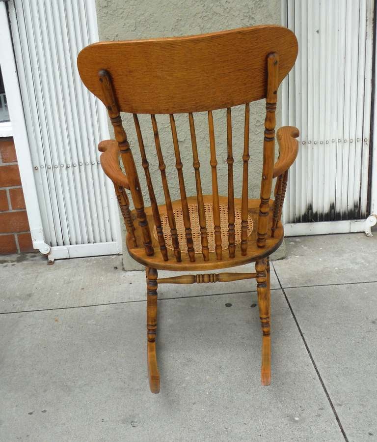 antique cane rocking chair identification