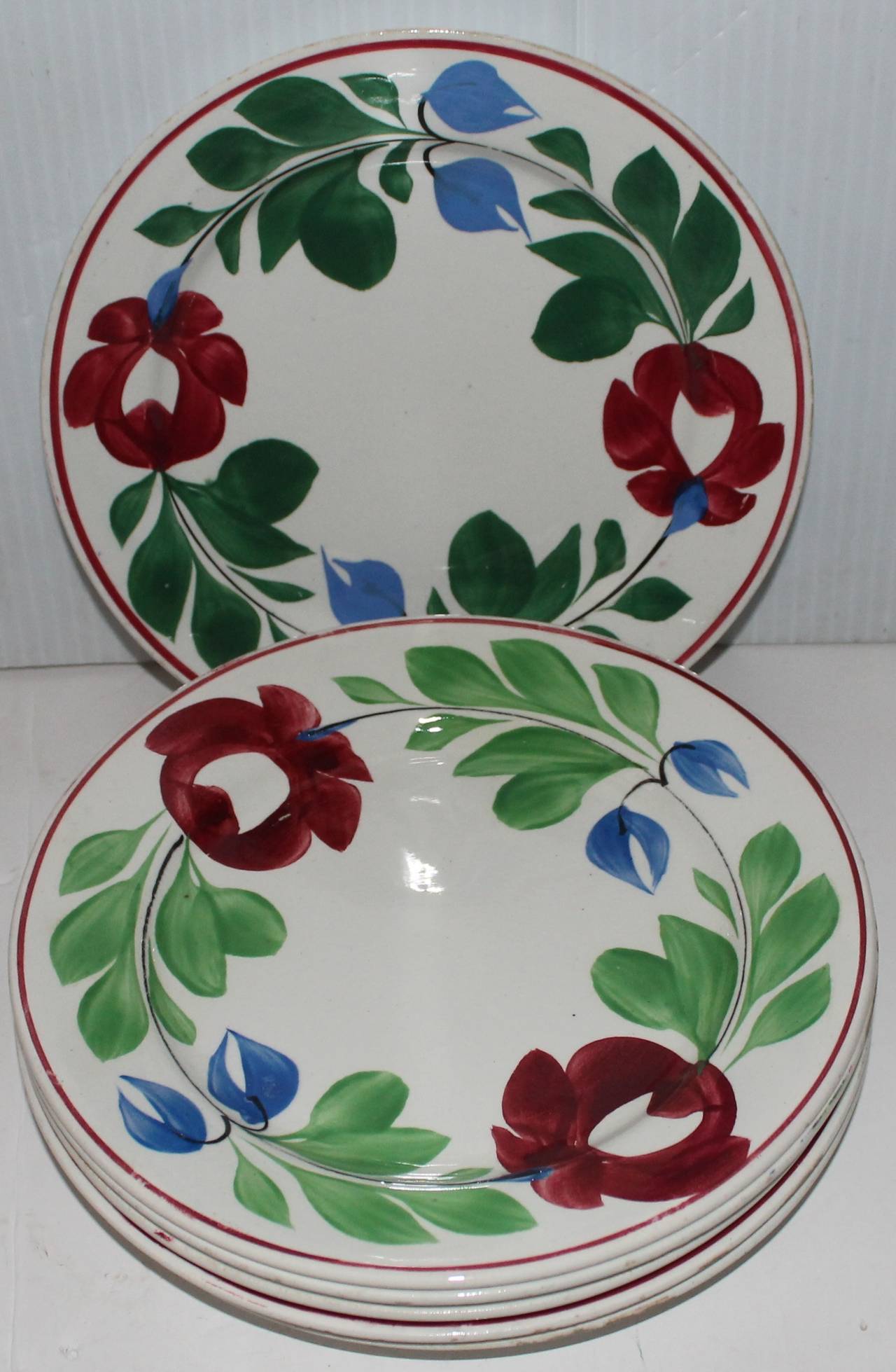 Set of six Adams rose plates are circa 1860-1870 signed on the back England. They are in very pristine condition. These hand-painted plates are a form of stick spatter.