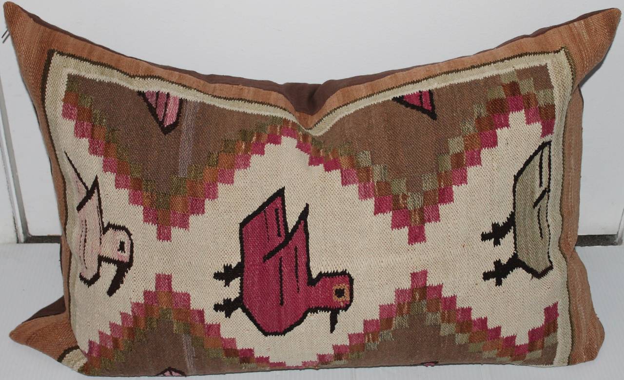 This fantastic Indian weaving is in great condition and has a chocolate brown cotton linen backing. The insert is down and feather fill. The pictorial birds are wonderful.
