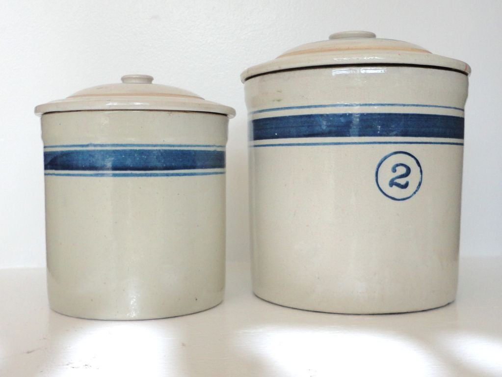 WONDERFUL 19THC BLUE & WHITE BANDED CROCKS FROM OHIO WITH GREAT NAUTICAL LOOK TO THEM. THESE ONE GALLON & TWO GALLON CROCKS HAVE ORIGINAL STRIPED LIDS.THEY ARE IN PRISTINE CONDITION, NO CHIPS OR CRACKS. GREAT FOR THE KITCHEN OR PANTRY. SOLD AS A