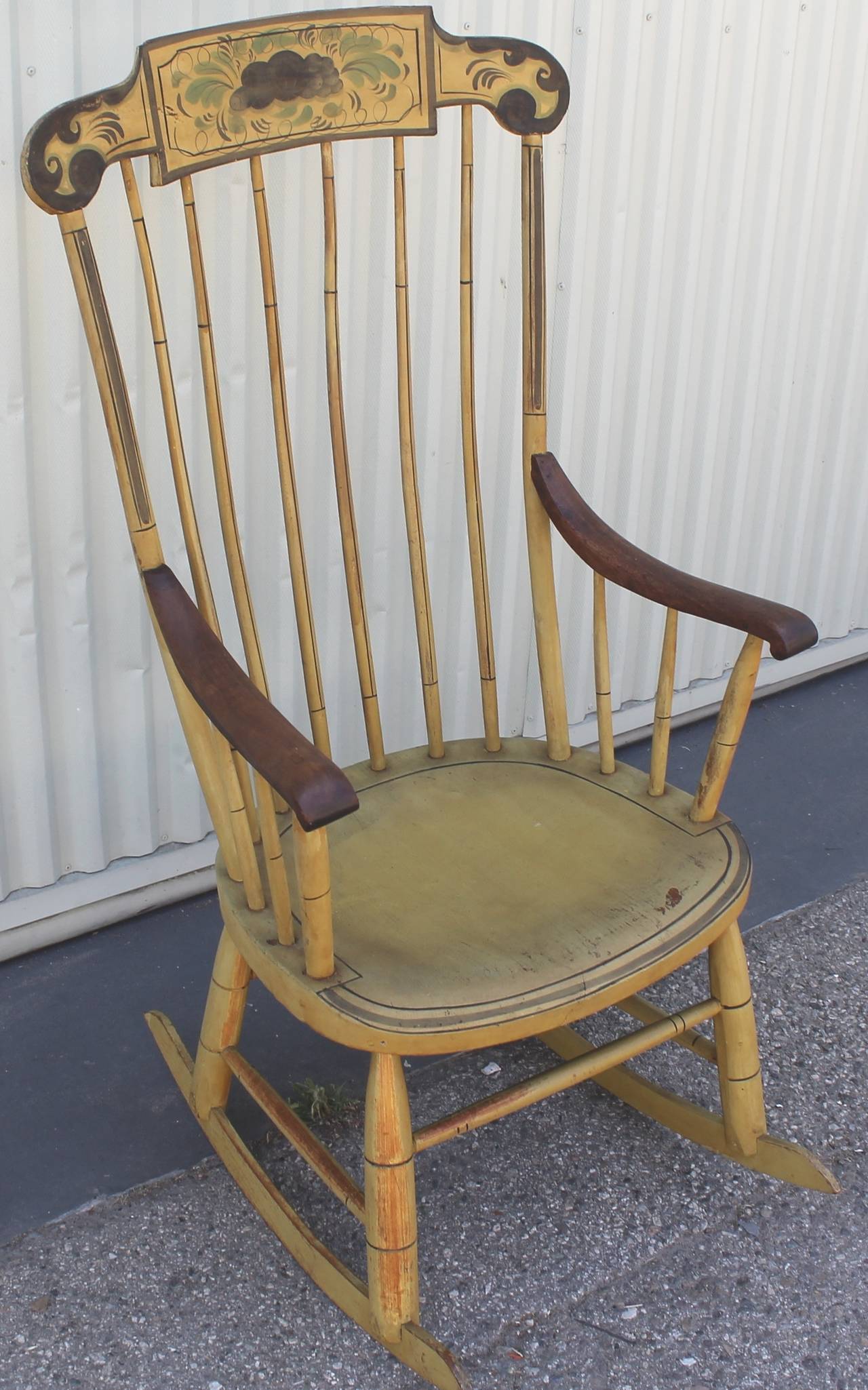 This untouched original painted 19th century rocking chair is in pristine condition. The paint on this rocking chair is untouched. This is truly is a rare find. This item has wear consistent with its age. Amazing patina.