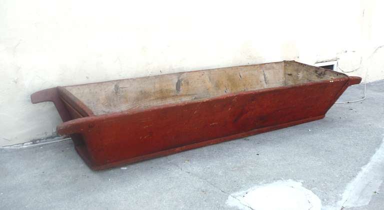 19thc Original red painted horse or cow watering trough from Lancaster ,Pennsylvania farm house .These large troughs make the best container for wood or plants on a porch or store display.This early hand made wood container is heavy and sturdy .It