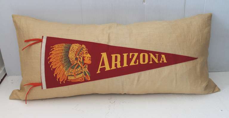Amazing Arizona Indian chief pennant sewn on cotton linen in a large bolster form pillow. This cool pillow is down and feather fill with a zipper closure. Its condition is very good.