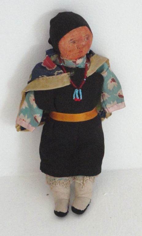 THIS WONDERFUL INDIAN DOLL HAS ALL HER ORIGINAL CLOTHING AND IS IN GREAT CONDITION.THIS COCHITI INDIAN DOLL IS QUITE RARE TO FIND IN SUCH GOOD CONDITION.