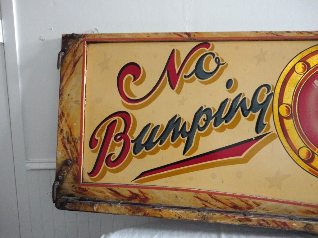 FANTASTIC ORIGINAL LARGE PAINTED EARLY 20THC DOUBLE SIDED PRE- BUMPER CAR SIGN FROM A CARNIVAL.THIS WONDERFUL DODGEM CAR SIGN HAS A DOUBLE SIDE SURFACE.THIS ORIGINAL  DECORATED PAINTED BORDER AND FRAME IS FANTASTIC AND HAS EARLY IRON WORK.THIS BACK