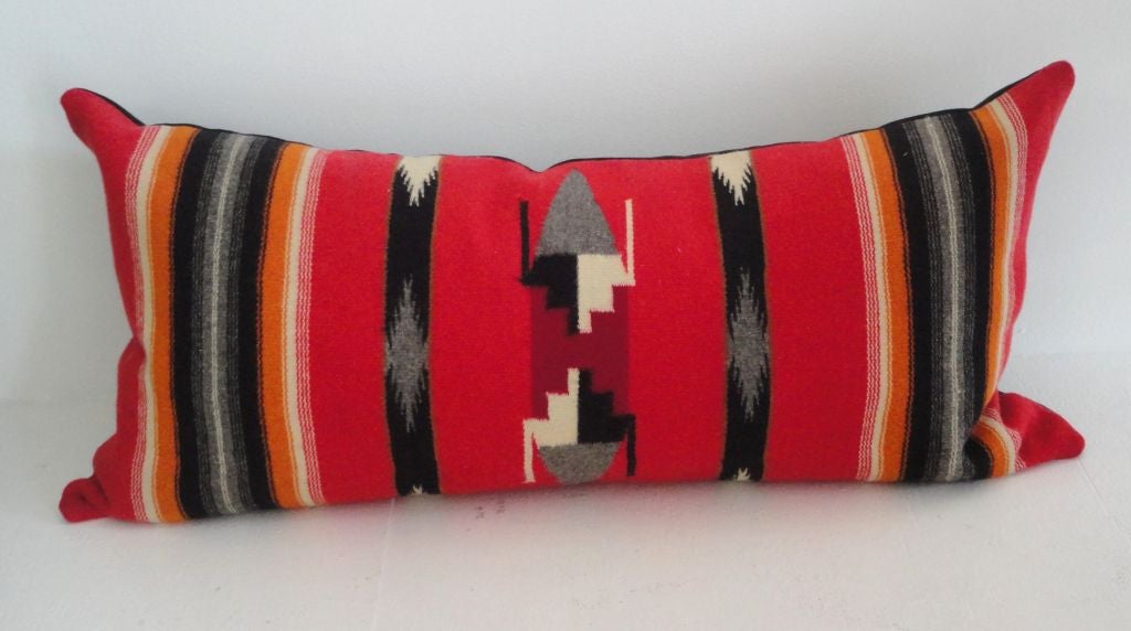FANTASTIC BOLD RED GROUND WITH SHADES OF ORANGE AND GREY .THIS GRAPHIC BOLSTER PILLOW IS IN GREAT CONDITION AND HAS A BLACK LINEN BACK.