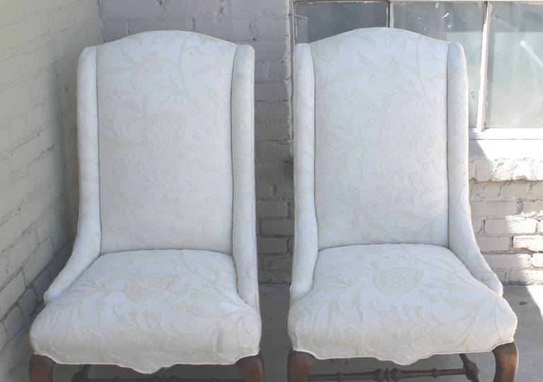 Pair of Tall Back Wing Chairs Upholstered in Crewel Work Fabric In Excellent Condition In Los Angeles, CA