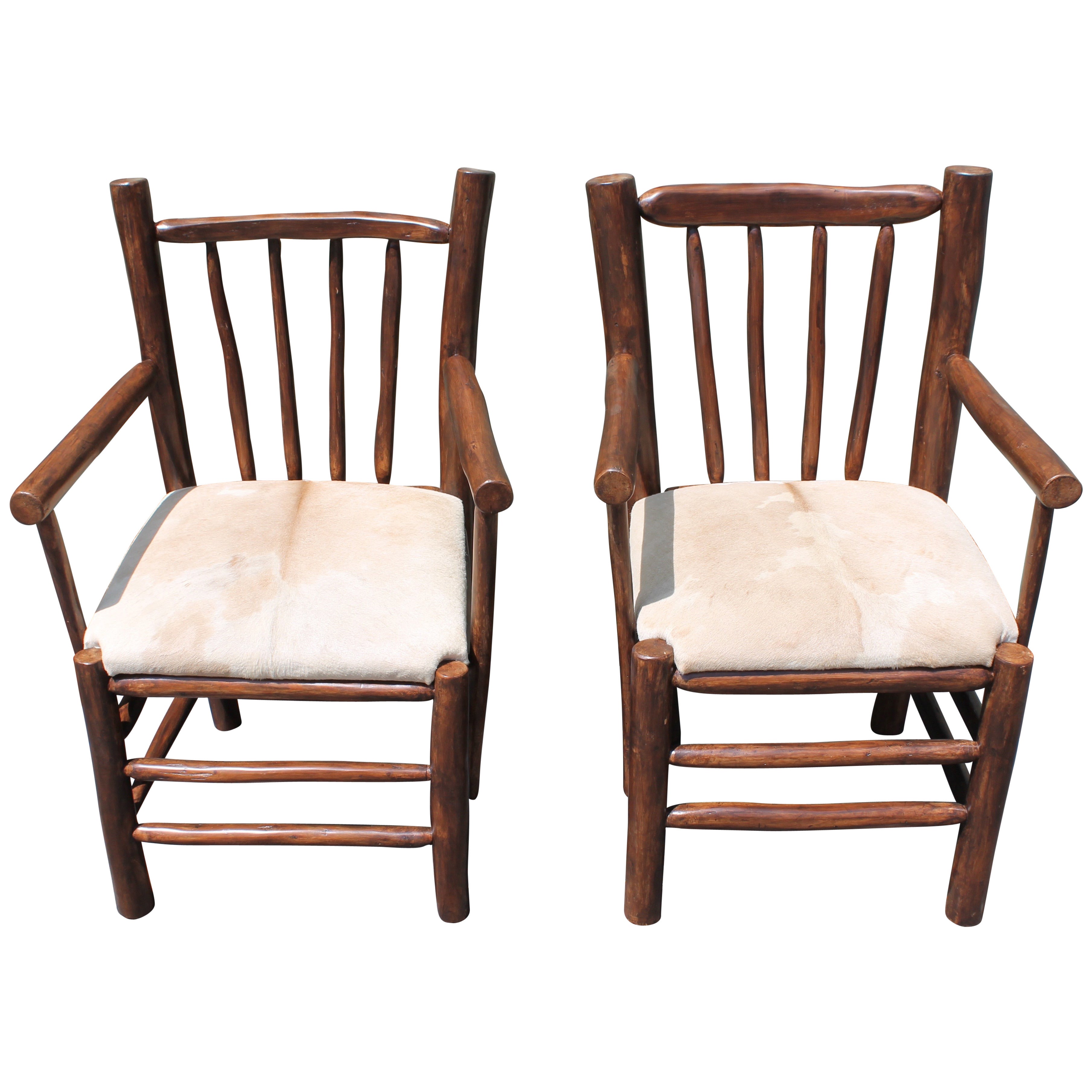 Pair of Rustic  Hickory Chairs With Cow Hide Seats