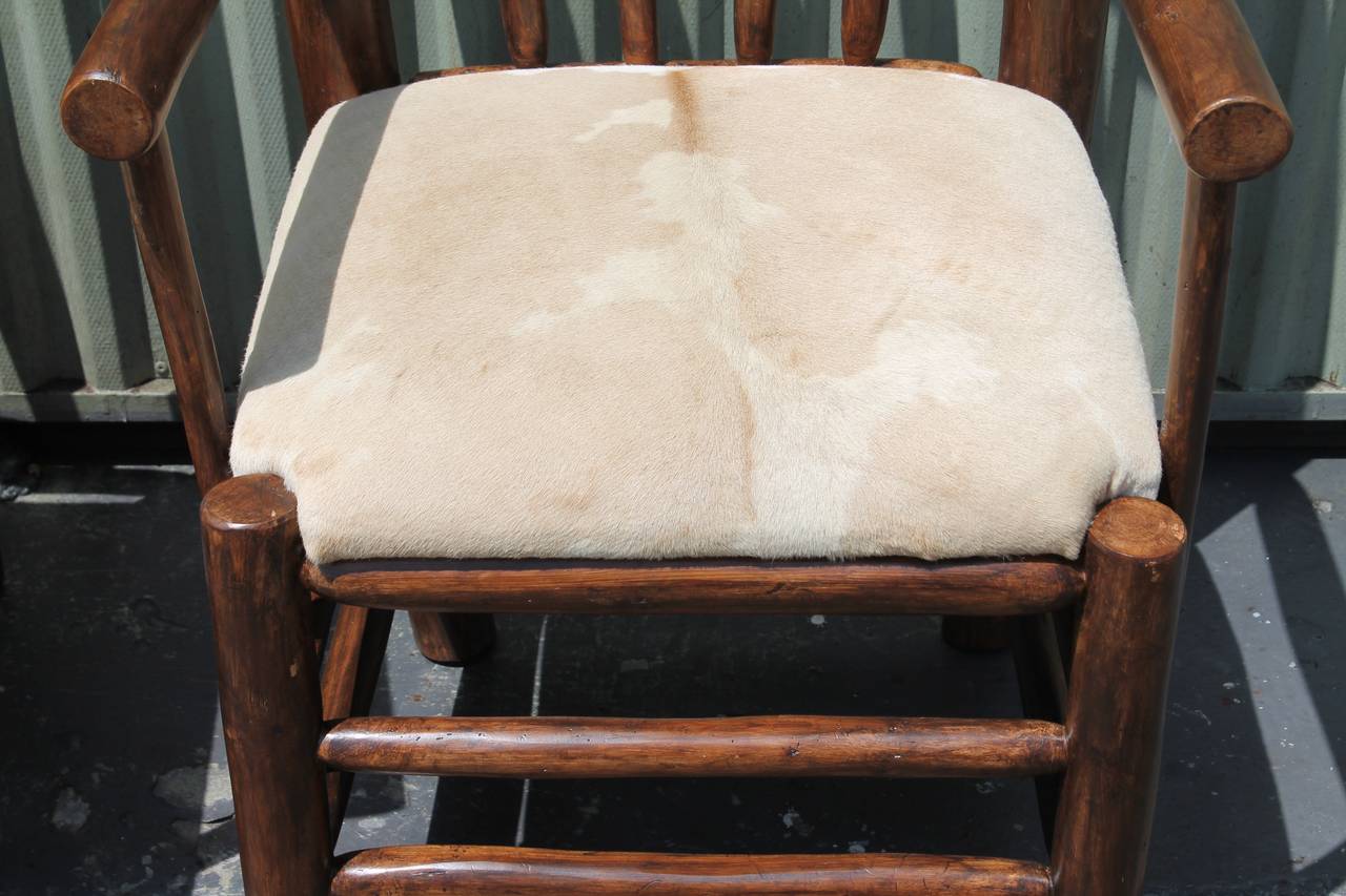 American Pair of Rustic  Hickory Chairs With Cow Hide Seats