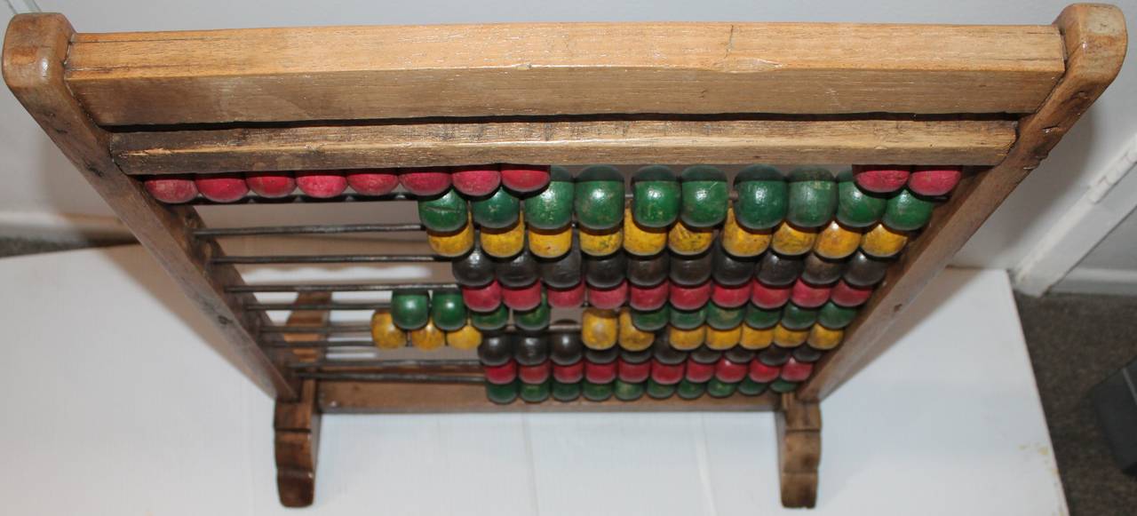 Painted 19th Century Abacus on a Early Hand-Carved Stand