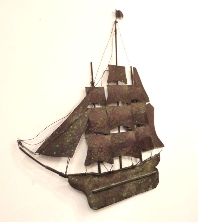 EARLY 20THC FOLKY HANDMADE COPPER SHIP WALL ART SCULPTURE .THIS COPPER SHIP IS THREE DIMENSIONAL  AND HAS THE LOOK OF A WEATHER VANE BUT IS NOT. IT IS SO WELL MADE WITH GREAT DETAIL TO THE ROPES AND STERN.THE BACK IS SIGNED BY THE MAKER.THE SHIP IS