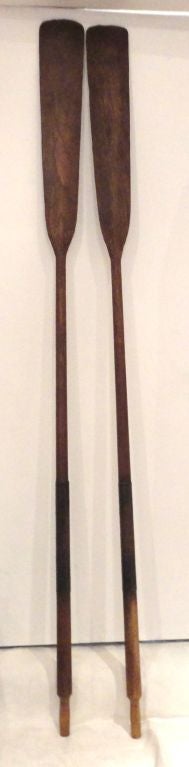 19THC ORIGINAL OLD WORN SURFACE BOAT OARS WITH METAL GRIP BANDS.THESE OARS HAVE SUCH A WONDERFUL OLD PATINA AND GREAT CONDITION.