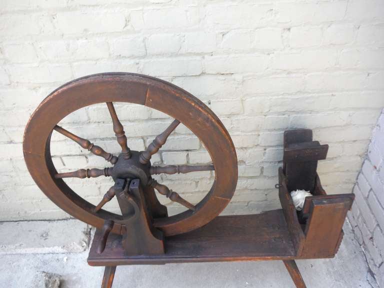 18th century spinning wheel