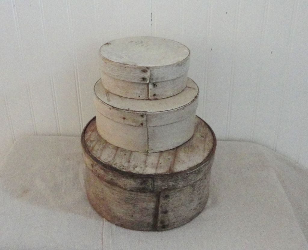 FANTASTIC STACK OF THREE 19THC ORIGINAL WHITE PAINTED PANTRY BOXES FROM NEW ENGLAND .THIS GROUP ARE FROM A PRIVATE COLLECTION AND IN VERY GOOD CONDITION.THE MEDIUM BOX HAS THE NAME 