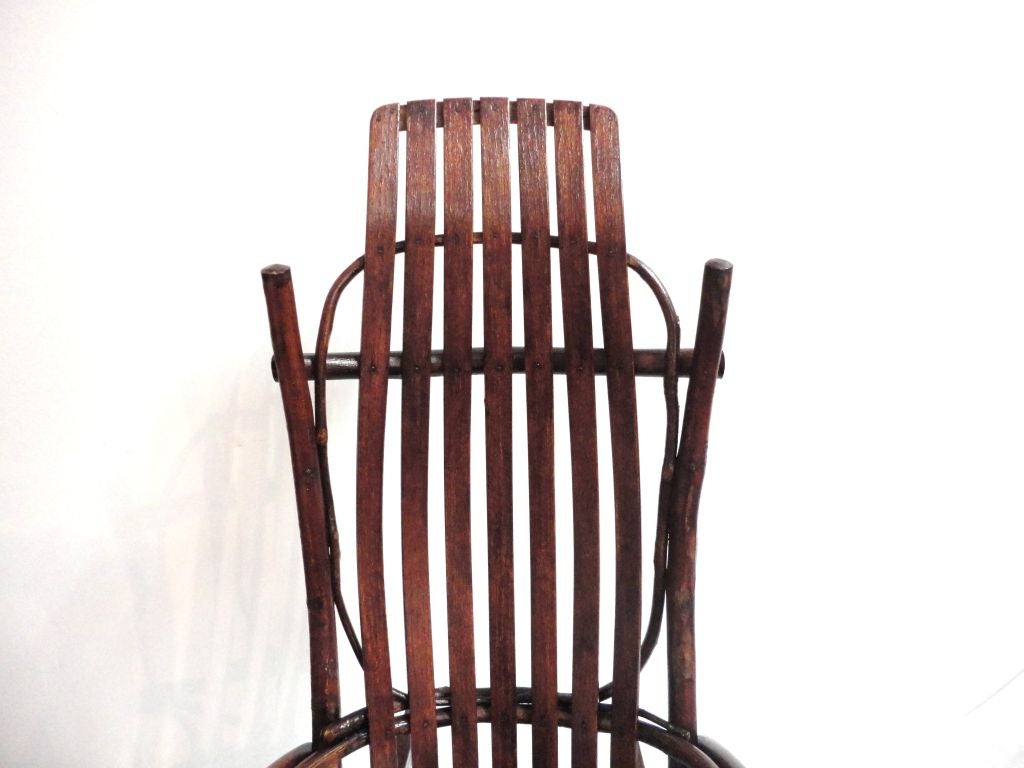 FANTASTIC FORM AND CONDITION AMISH CHILD'S BENTWOOD OR HICKORY ROCKING CHAIR.THESE ROCKING CHAIRS WERE ALWAYS FOUND AND MADE IN THE AMISH COMMUNITY'S .HOW EVER THEY WERE SOLD MORE RECENTLY TO THE TRADE AND GENERAL PUBLIC.IT IS VERY RARE TO FIND THE