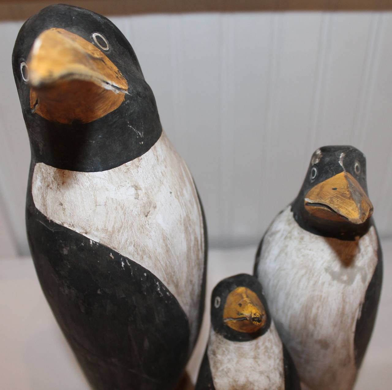 These hand-carved and painted Folk Art penguin’s come from a wonderful and whimsical Folk Art collection in Beverly Hills, California. The condition are very good with minor nicks and chips consistent with age and wear.