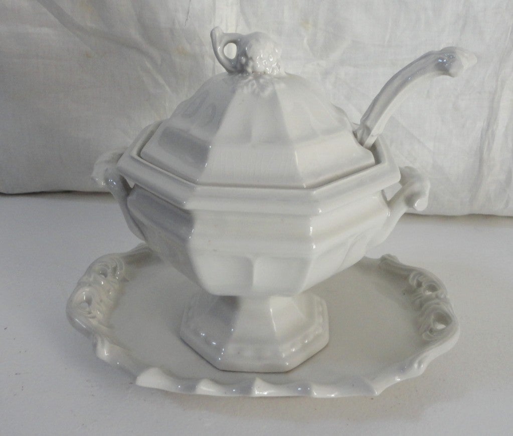 Fantastic large English ironstone covered tureen,laddle and serving tray.Sold as a four piece set.This early 19thc ironstone has the early hallmarks in the diamond form on all pieces.The condition is very good on all pieces,but the laddle has a