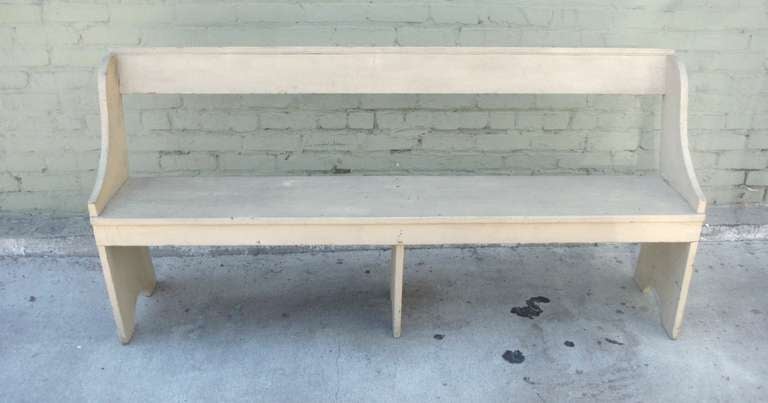 19thc Original cream painted farmhouse bench from Pennsylvania .The condition is very good with square nailed and mortised construction . This is a very sturdy bench .