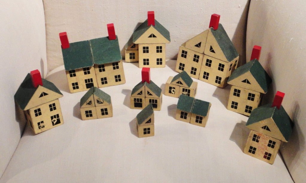 Fun and folky original painted little village of houses.This handmade & painted set of houses are great on a shelf with other folk art.Sols as a group collection.Great conditions with  some minor dings or scratches.