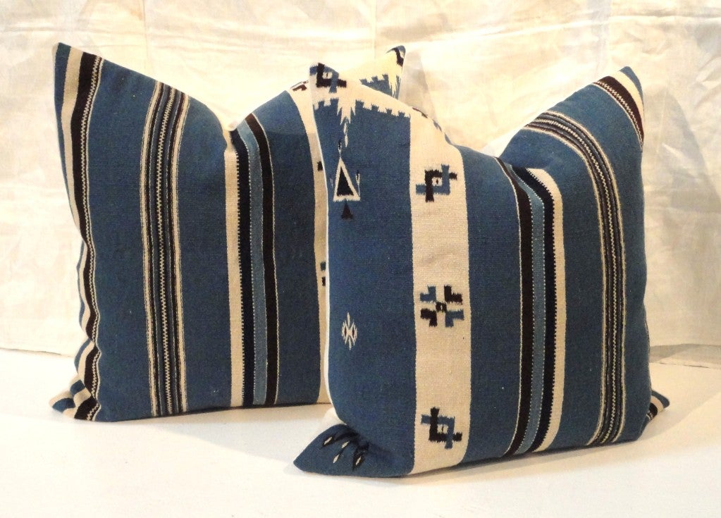 Texcoco Mexican Indian weaving pillows.These cool stripes have small geometric pattern on the sides.The backing is a woolen cream blanket fabric.Sold Individually.