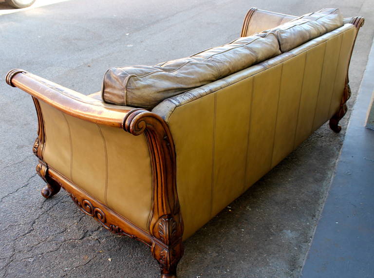 Monumental Distressed Leather and Carved Wood Sofa 1