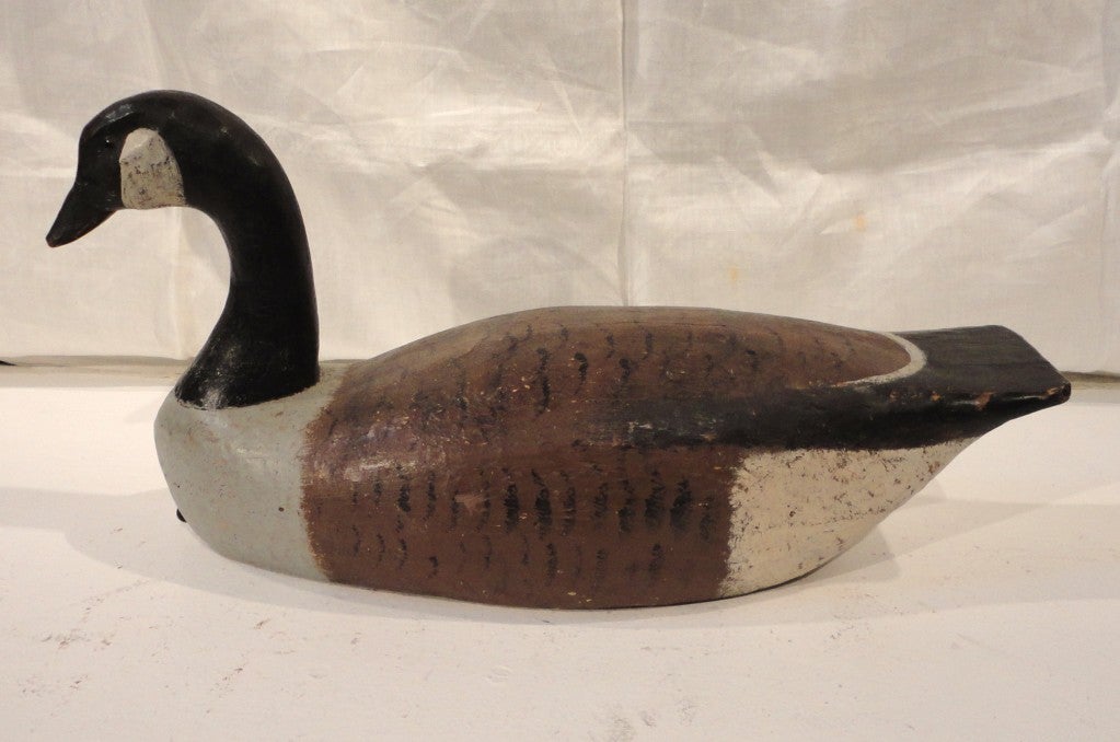 Fantastic pair of original painted and hand carved signed Canadian geese. They are from New England and signed 