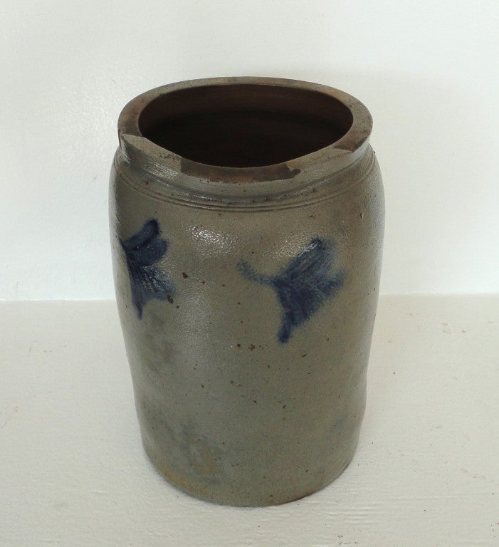 Early hand decorated salt glaze crock, with blue decorated flowers throughout.Great form and condition is good with some glaze loss from the top of crock, maybe in the making or glazing of the crock.This crock is from Pennsylvania.