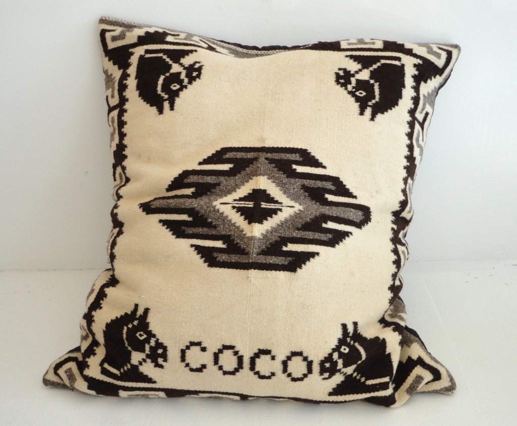 This large wonderful weaving was probably made and named after someones horse called 'COCO' .It has fantastic horses in each corner.The back is finished in dark cotton linen.This is a large bolster pillow and is in great condition.