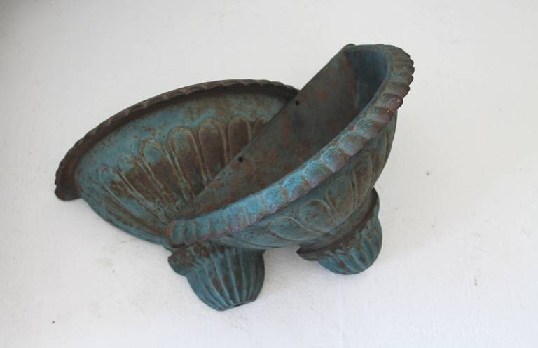 This pair of 19th century original painted wall urns are quite rare and most likely made by Fiske of New York. They are in great condition and have a super untouched patina. Great on a out side porch or wall.