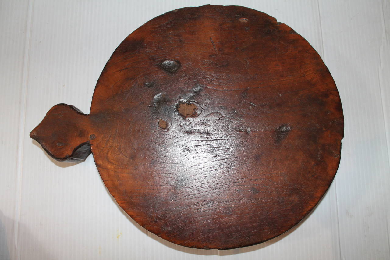 Patinated Early 19th Century Round Cutting Board on Feet