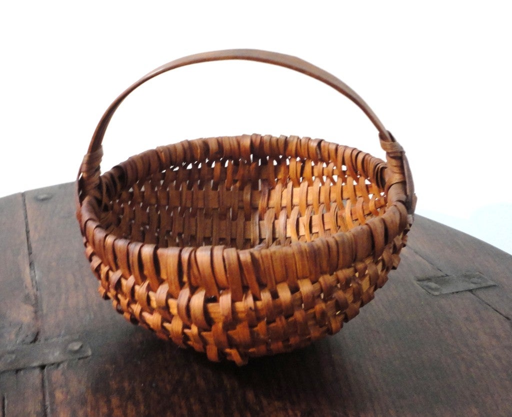 Early handmade small buttocks basket from New England in great condition.This miniature basket is from a private collection.Always hard to find in this condition.