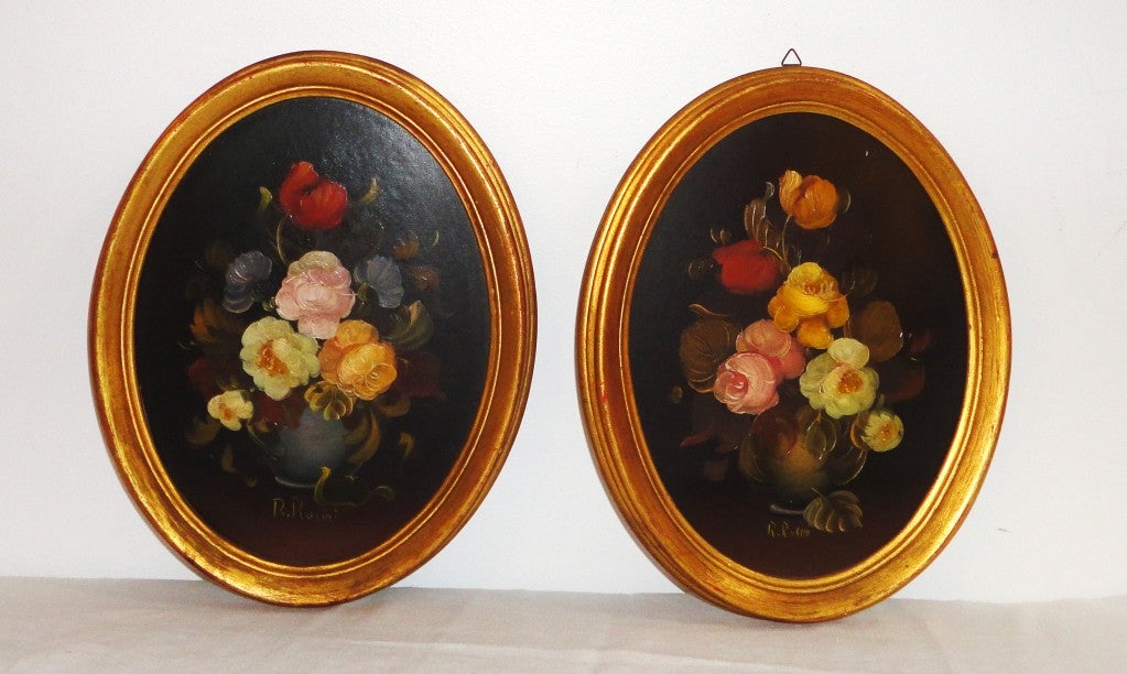 This pair of wonderful floral still life paintings in the original gilded frames are both signed by the artist 'R.ROSINI'. The backing have the original wall paper on.The condition are mint.The detail work is fantastic and the paintings are very