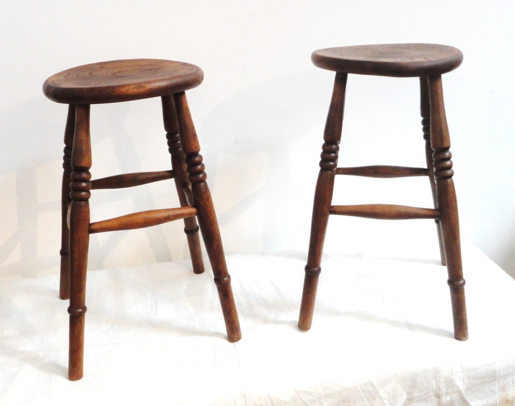 Pair of fantastic and sturdy early 19th century English pub stools in great original surface. These wonderful stools are matching and quite great form. Sold as a pair.