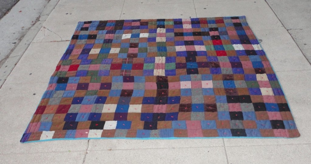 Early 20th century one-patch quilt from Pennsylvania. This fun and colorful quilt is made from wool and velvets. The back is a polished cotton and has cotton ties through out. This was found in Lancaster County, Pennsylvania. The condition is very