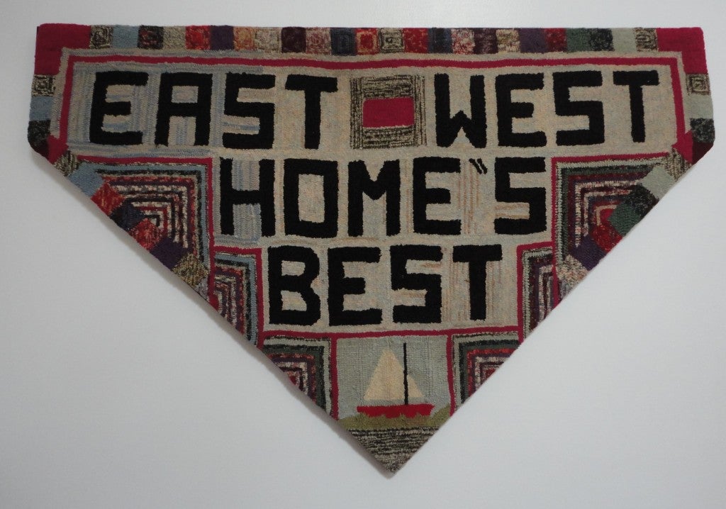 Folky and fun pictorial mounted hand-hooked rug on stretcher frame. In bold letters it reads: 