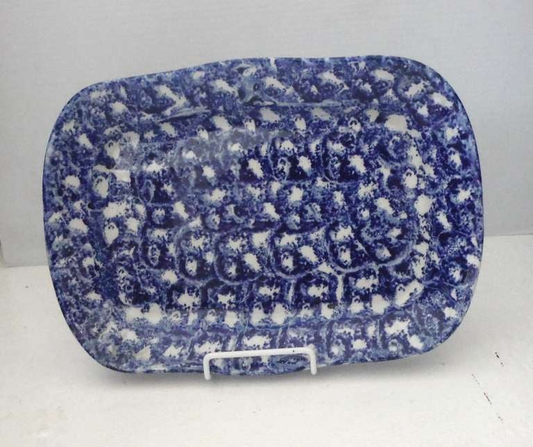This wonderful patterned spongeware platter is in great condition and is decorated on both front and back. This platter was found in a collection from Pennsylvania. This stone ware platter is a great show piece for wall or cupboard.
