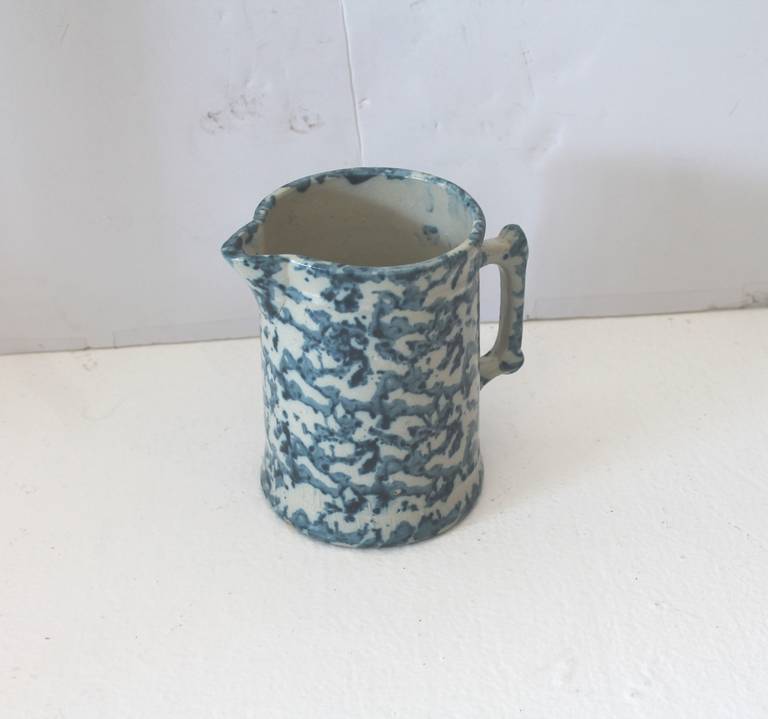 This most unusual 19th century spongeware pitcher is in great condition with a minor base chip. No cracks. It is a great size to add to any collection.