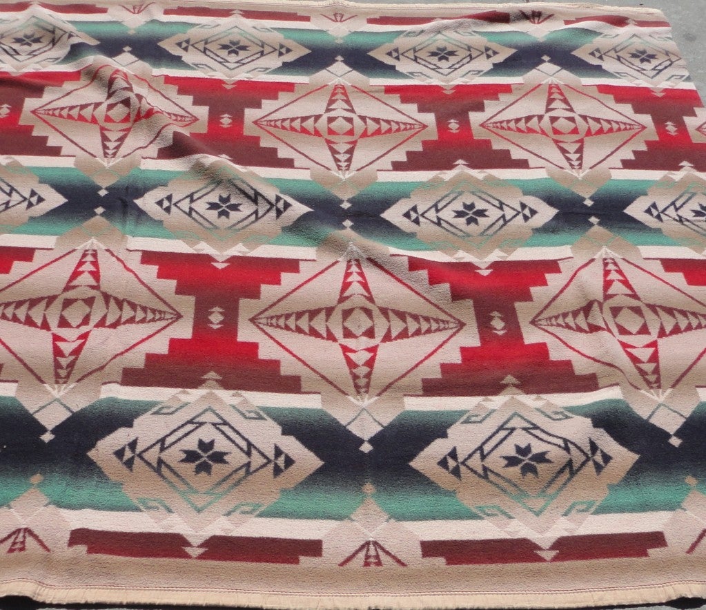 Fantastic geometric Indian design Beacon camp blanket.This blanket has all the bells & whistles.The colors are wonderful and the pattern is fantastic.
