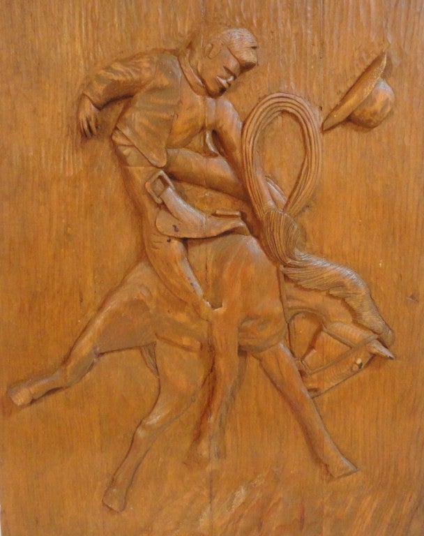 This fantastic hand carved WPA plaque is the cowboy riding the horse.The carving is unsigned.The condition is very good with a minor age crack.Ready to hang in your ranch or western collection.