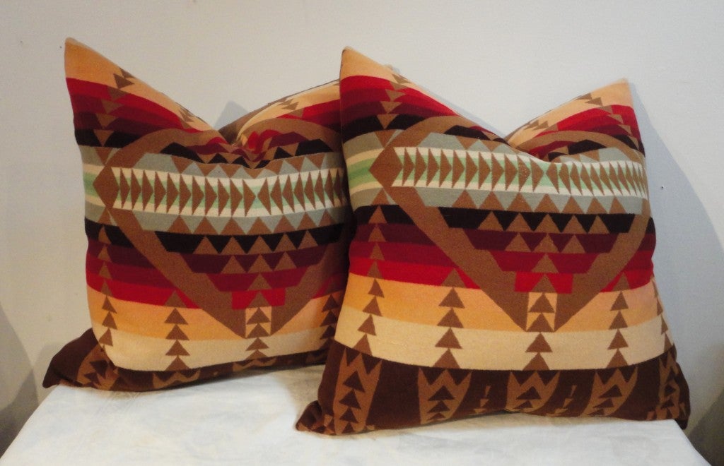 Fantastic Pendleton Indian design wool blanket pillows sold as a pair.The backing is coffee colored linen.