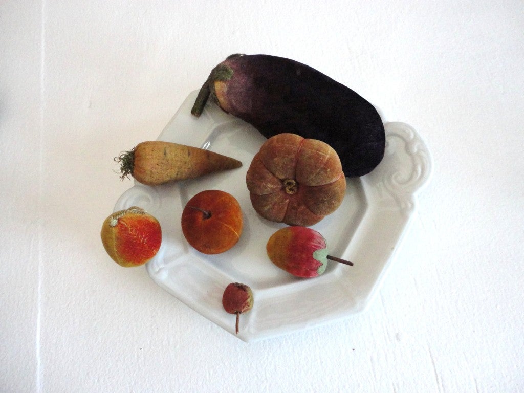 This amazing group of velvet fruit & vegetables are all 19thc except the egg plant of which is early 20thc, probably 1920's.So very hard to come by and in wonderful colors and condition.The small rare cherry has some old repairs but still in