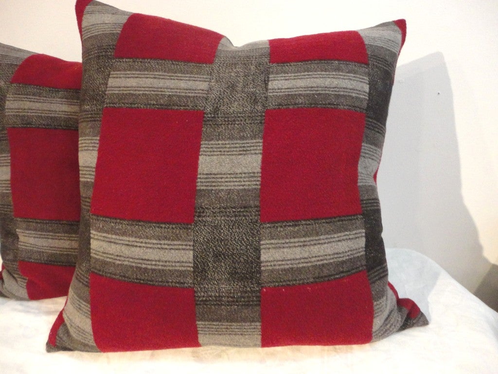 Amazing burg. and grey Beacon camp blanket pillows with cotton linen backing.The inserts are down and feather fill.Sold as a pair.Four in stock.