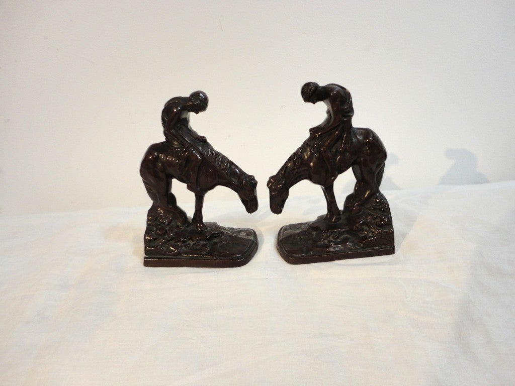 American Pair of Dated 1928 Bronze-Plated Iron Bookends, End of the Run