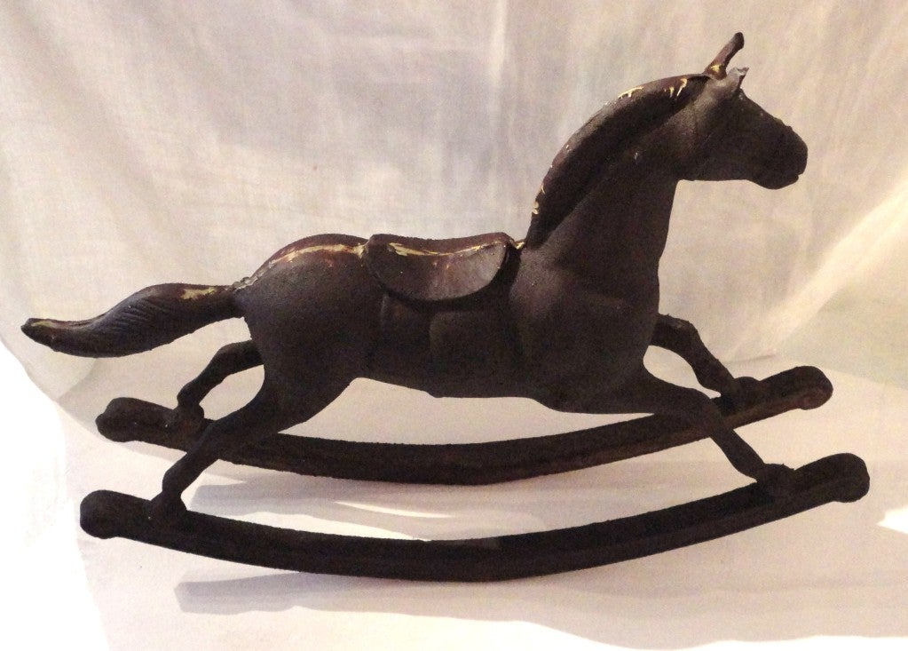 vintage cast iron rocking horse