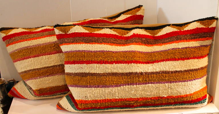This is a vibrant yet simple striped pattern Indian weaving saddle blanket pillows. Sold as a pair. Great condition.