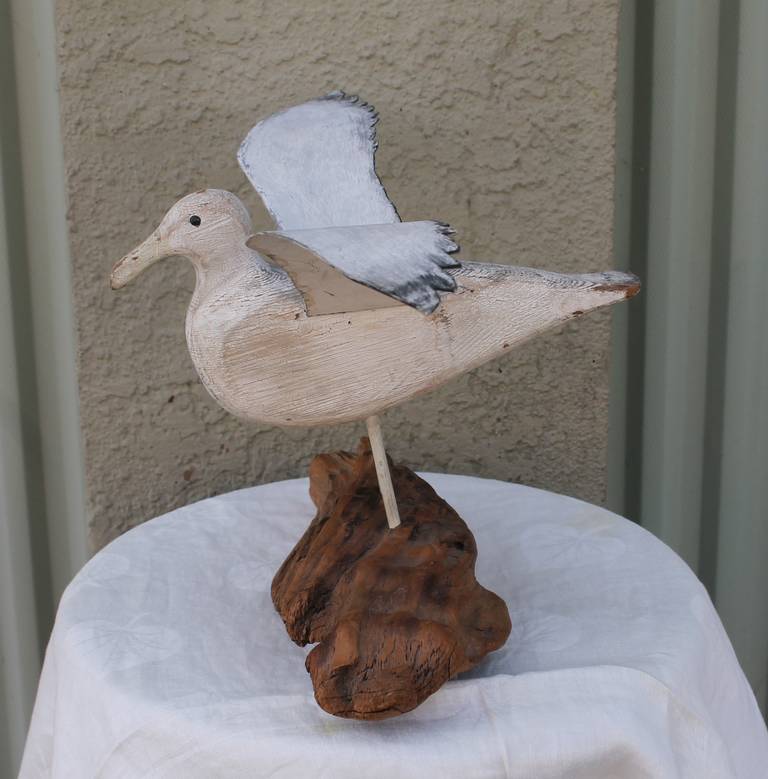 wooden seagulls carved