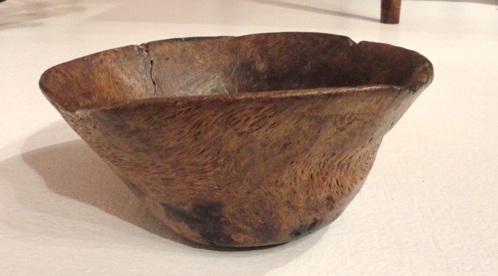 This wonderful early American Indian hand-carved burl bowl was found in a collection in California. She purchased it over 30 years ago. It has such fantastic untouched form and patina. The base has old worn black surface.
